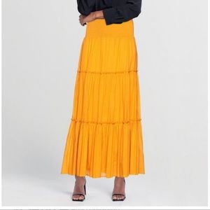 NWT Tory Burch gold crest smocked skirt